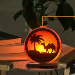 3D camel style Himalayan salt lamp glowing on table